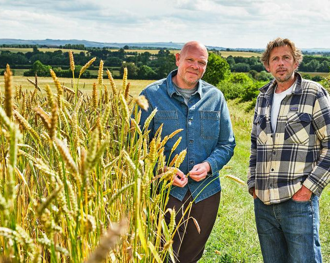 Andy Cato & Tom Kerridge standing in a field with wheat, with 'The Foodhall' logo in the corner.